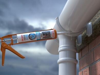 Evostik Sticks Like adhesive sealant being applied around a white gutter joint on an exterior rainwater system, creating a weatherproof seal between connected downpipe components.